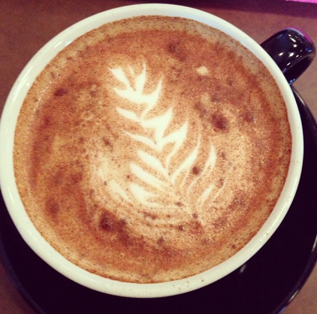 Espresso with a leaf design in the foam